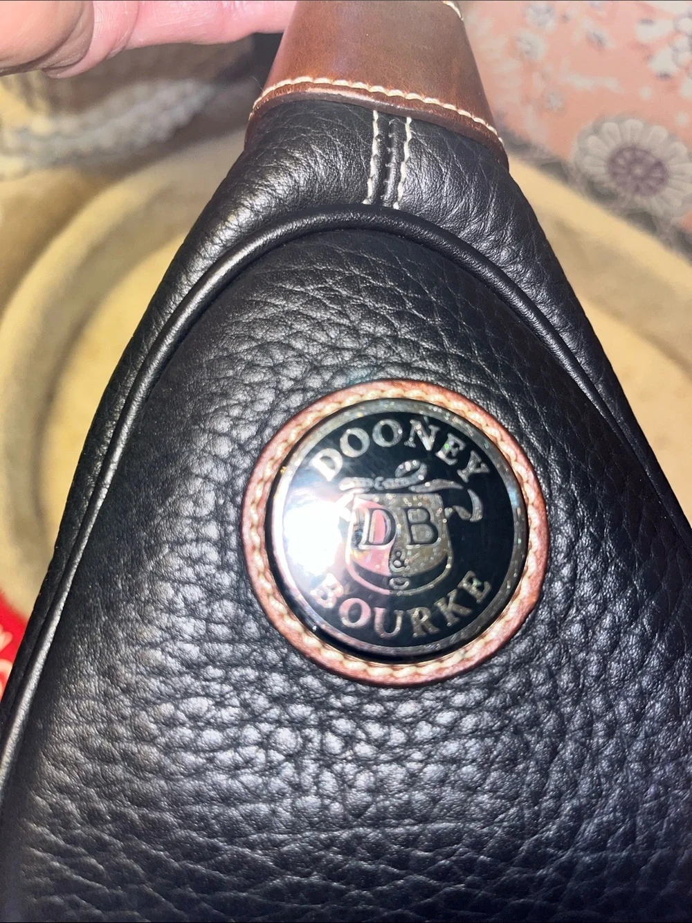Dooney & Bourke Black Pebbled Leather Messenger Bag with Brown Trim